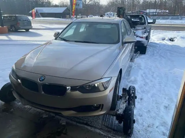 A customer at Nogueira Automotive Mechanic, LLC dropping off their vehicle for repair or maintenance outside of regular business hours, utilizing the convenient after-hours drop off service.