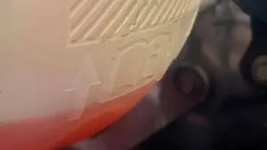 A technician at Nogueira Automotive Mechanic, LLC performing repairs and maintenance on a vehicle's heating and cooling systems to ensure optimal performance and comfort.