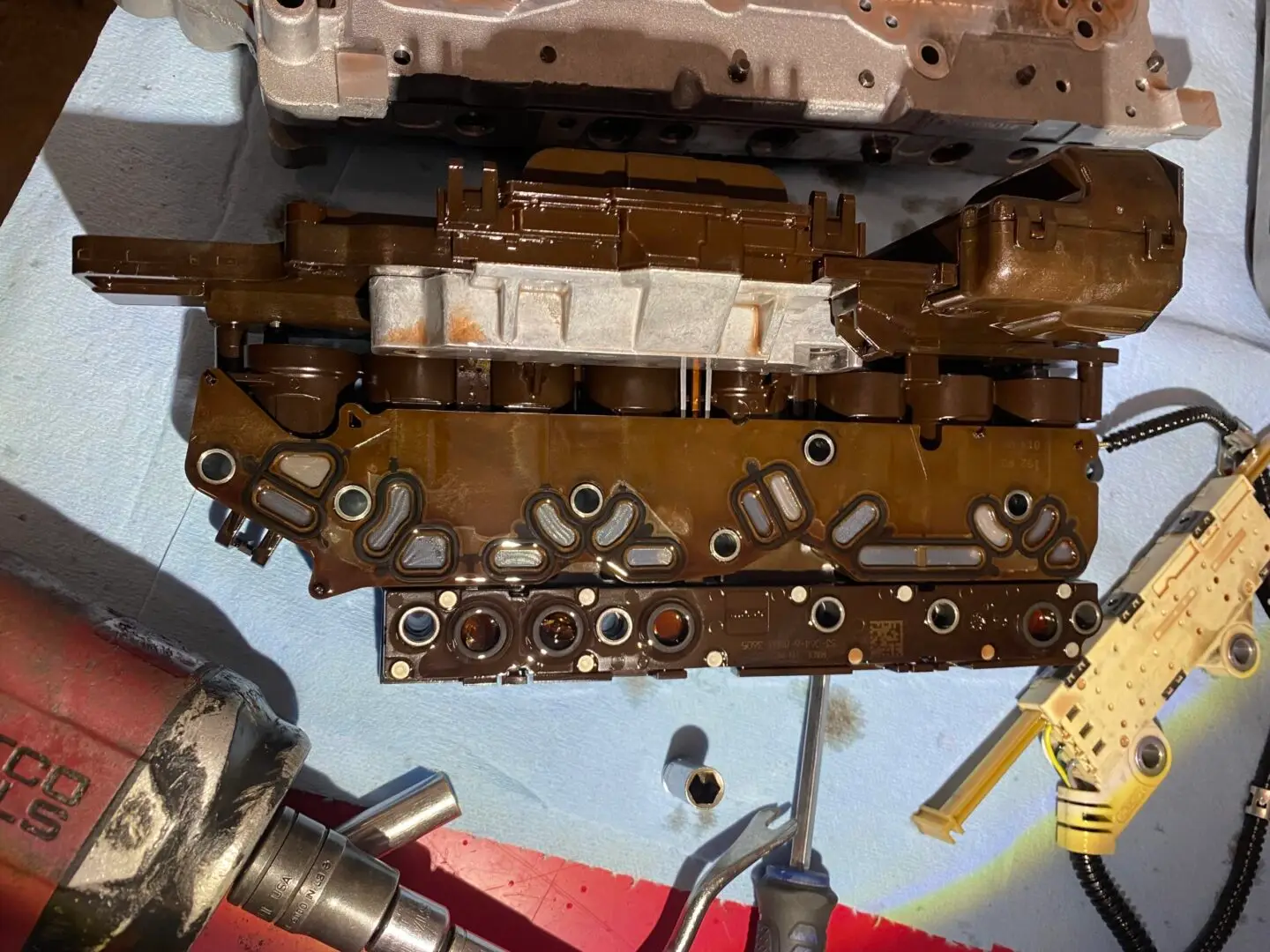 Image of a TCMI (Transmission Control Module Interface) used for diagnosing and repairing automatic transmissions.